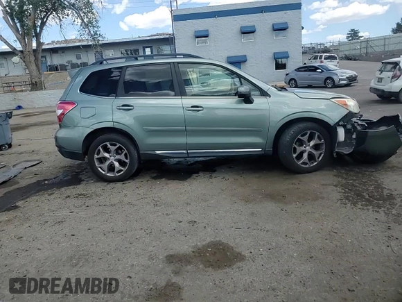 2015 Subaru Forester Touring z VIN JF2SJAUC9FH489669, wystawiony jako Copart lot #55339775 z przebiegiem 114 814 mil mil oraz Szkoda całkowita • Salvage title. Historia ofert i sprzedaży dostępna na DreamBid. Obrazek 14.