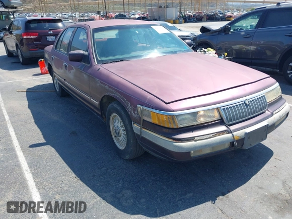 1992 Mercury Grand Marquis LS z VIN 2MECM75W4NX749141, wystawiony jako IAAI lot #42413769 z przebiegiem 296 805 mil mil oraz . Historia ofert i sprzedaży dostępna na DreamBid. Obrazek 1.
