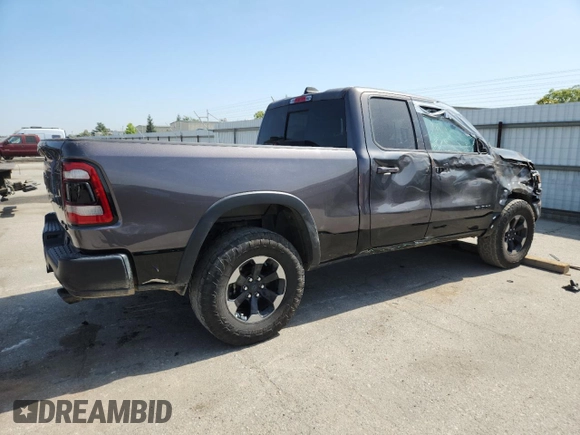 2019 Ram 1500 Rebel z VIN 1C6SRFET7KN875819, wystawiony jako Copart lot #57805775 z przebiegiem 80 521 mil mil oraz Szkoda całkowita • Salvage title. Historia ofert i sprzedaży dostępna na DreamBid. Obrazek 3.