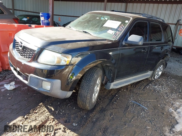 2011 Mazda Tribute Sport with VIN 4F2CY9C7XBKM06202, listed as a IAAI auction lot 41281197 with 195,443 mi miles and . Bid and sale history available at DreamBid. Image 16.