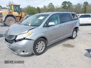 2012 Toyota Sienna XLE AAS with VIN 5TDYK3DC4CS251821, listed as a IAAI auction lot 41932724 with 149,395 mi miles. Bid and sale history available at carsss.com. Image 2.