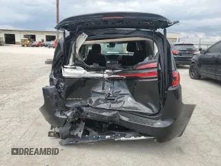 2023 Chrysler Pacifica Touring L with VIN 2C4RC1BG4PR621126, listed as a Copart auction lot 56694085 with 42,659 mi miles and Salvage title. Bid and sale history available at DreamBid. Image 6.