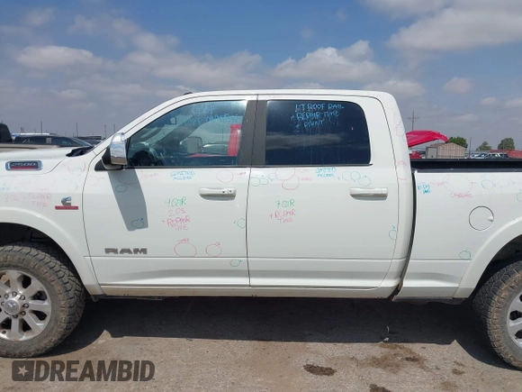 2022 Ram 2500 Laramie with VIN 3C6UR5FL0NG143918, listed as a IAAI auction lot 42373907 with 91,918 mi miles and . Bid and sale history available at DreamBid. Image 14.