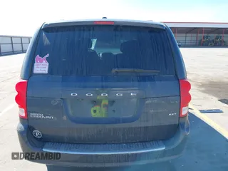 2014 Dodge Grand Caravan SXT with VIN 2C4RDGCG1ER167624, listed as a IAAI auction lot 41888822 with 202,729 mi miles and . Bid and sale history available at DreamBid. Image 16.