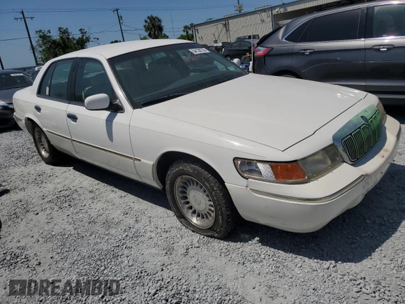 2000 Mercury Grand Marquis LS z VIN 2MEFM75W3YX689886, wystawiony jako Copart lot #54128735 z przebiegiem 54 819 mil mil oraz Szkoda całkowita • Salvage title. Historia ofert i sprzedaży dostępna na DreamBid. Obrazek 4.
