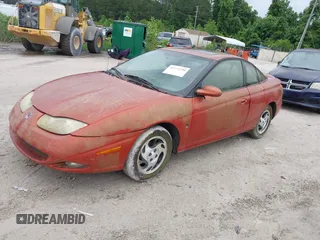 2002 Saturn SC z VIN 1G8ZR12742Z146956, wystawiony jako IAAI lot #42175290 z przebiegiem Nie podano mil oraz . Historia ofert i sprzedaży dostępna na DreamBid. Obrazek 2.