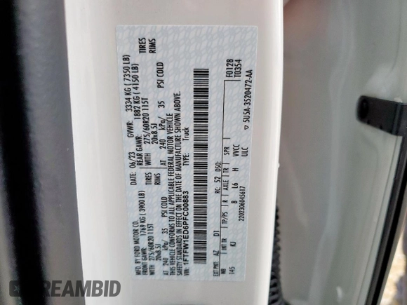 2023 Ford F-150 XL with VIN 1FTFW1ED6PFC00883, listed as a Copart auction lot 60438105 with 27,640 mi miles and Salvage title. Bid and sale history available at DreamBid. Image 12.