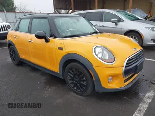 2018 MINI Hardtop 4 Door Cooper with VIN WMWXU1C59J2F79169, listed as a IAAI auction lot 40973679 with 97,507 mi miles and . Bid and sale history available at DreamBid. Image 1.
