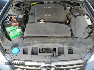 2005 Infiniti Q45 z VIN JNKBF01A85M101123, wystawiony jako Copart lot #72220124 z przebiegiem 111 464 mil mil oraz Szkody całkowita. Historia ofert i sprzedaży dostępna na DreamBid. Obrazek 11.