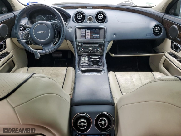 2014 Jaguar XJ with VIN SAJWJ2GD6E8V65987, listed as a Copart auction lot 50091105 with 136,080 mi miles and Clean Title. Bid and sale history available at carsss.com. Image 8.