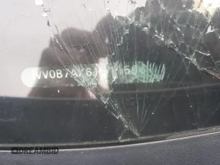 2018 Volkswagen Tiguan S z VIN 3VV0B7AX6JM115961, wystawiony jako Copart lot #51405135 z przebiegiem 92 096 mil mil oraz Szkoda całkowita • Salvage title. Historia ofert i sprzedaży dostępna na DreamBid. Obrazek 13.