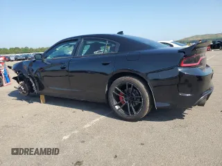 2016 Dodge Charger R/T with VIN 2C3CDXCT1GH204252, listed as a Copart auction lot 61090155 with 153,395 mi miles and Salvage title. Bid and sale history available at DreamBid. Image 2.