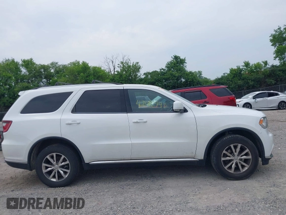 2016 Dodge Durango Limited with VIN 1C4RDJDGXGC387223, listed as a IAAI auction lot 42046793 with 156,032 mi miles and . Bid and sale history available at DreamBid. Image 13.
