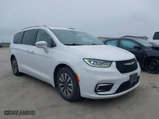 2021 Chrysler Pacifica Hybrid Touring L with VIN 2C4RC1L7XMR602817, listed as a IAAI auction lot 41605536 with 108,960 mi miles. Bid and sale history available at carsss.com. Image 1.