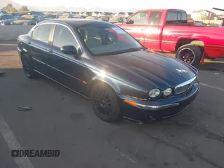 2007 Jaguar X-Type z VIN SAJWA51A57WJ26388, wystawiony jako IAAI lot #41166569 z przebiegiem 106 179 mil mil oraz . Historia ofert i sprzedaży dostępna na DreamBid. Obrazek 1.