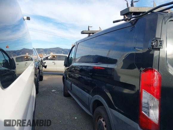 2015 Ford Transit Cargo with VIN 1FTYE1YM2FKA87298, listed as a IAAI auction lot 41241298 with 225,796 mi miles and . Bid and sale history available at DreamBid. Image 13.