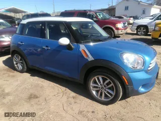 2013 MINI Cooper Countryman with VIN WMWZB3C56DWM31601, listed as a IAAI auction lot 41814031 with 139,417 mi miles. Bid and sale history available at carsss.com. Image 1.