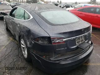 2018 Tesla Model S 75D with VIN 5YJSA1E24JF245215, listed as a Copart auction lot 63788121 with Not provided miles and Salvage title. Bid and sale history available at DreamBid. Image 3.