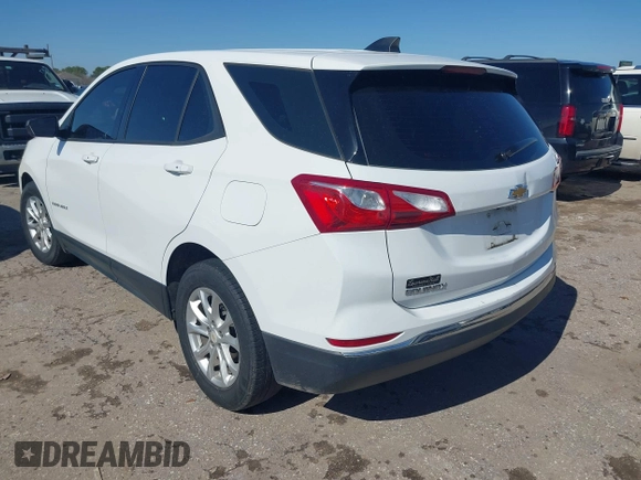 2018 Chevrolet Equinox LS with VIN 2GNAXHEV7J6293821, listed as a IAAI auction lot 41475150 with 80,785 mi miles and . Bid and sale history available at DreamBid. Image 3.