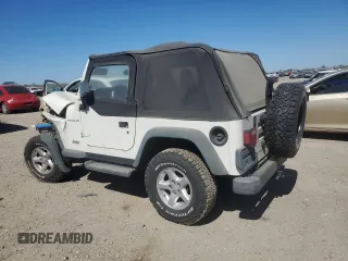 1997 Jeep Wrangler SE with VIN 1J4FY29PXVP411817, listed as a Copart auction lot 48755615 with 125,284 mi miles and Salvage Title. Bid and sale history available at DreamBid. Image 2.