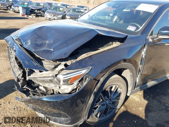 2017 Mazda CX-5 Grand Touring with VIN JM3KFBDL0H0104806, listed as a IAAI auction lot 41621964 with 60,728 mi miles. Bid and sale history available at carsss.com. Image 6.