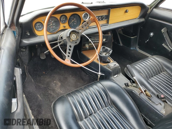 1974 FIAT 124 Spider z VIN 124CS10081683, wystawiony jako Copart lot #58650195 z przebiegiem 143 647 mil mil oraz Czysty tytuł • Clean title. Historia ofert i sprzedaży dostępna na DreamBid. Obrazek 8.