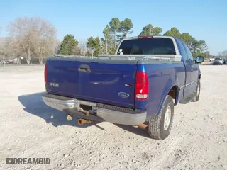 1998 Ford F-150 Standard with VIN 1FTRX18L4WKB26155, listed as a IAAI auction lot 41770257 with 319,239 mi miles. Bid and sale history available at carsss.com. Image 6.