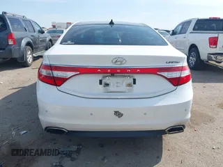 2015 Hyundai Azera Limited with VIN KMHFH4JG7FA476458, listed as a IAAI auction lot 41893979 with 149,114 mi miles and . Bid and sale history available at DreamBid. Image 16.