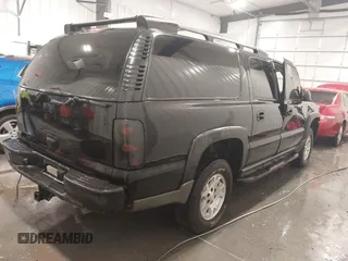 2003 Chevrolet Suburban Z71 with VIN 3GNFK16Z33G275630, listed as a IAAI auction lot 41937310 with 224,207 mi miles. Bid and sale history available at carsss.com. Image 4.