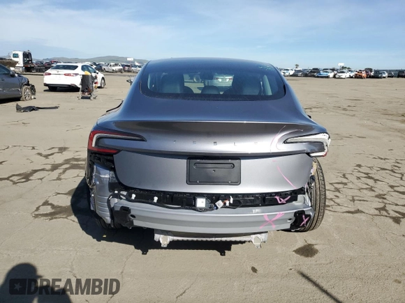 2025 Tesla Model 3 Long Range with VIN 5YJ3E1EA8SF890337, listed as a Copart auction lot 45023425 with 1,765 mi miles and Salvage Title. Bid and sale history available at DreamBid. Image 6.