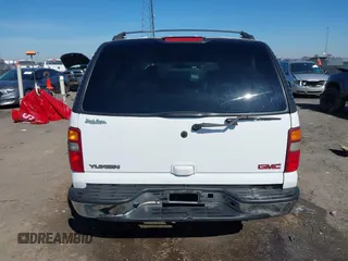 2003 GMC Yukon SLT with VIN 1GKEC13Z13J197955, listed as a IAAI auction lot 41586841 with 208,752 mi miles. Bid and sale history available at carsss.com. Image 19.