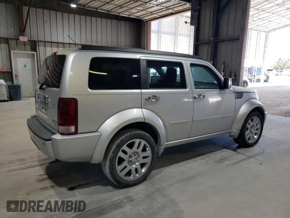 2008 Dodge Nitro R/T z VIN 1D8GU58618W151545, wystawiony jako Copart lot #75465574 z przebiegiem Nie podano mil oraz Szkoda całkowita • Salvage title. Historia ofert i sprzedaży dostępna na DreamBid. Obrazek 3.