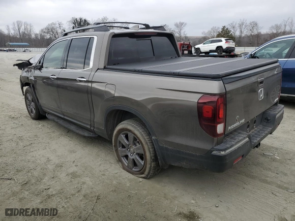 2020 Honda Ridgeline RTL-E with VIN 5FPYK3F73LB001983, listed as a Copart auction lot 44222325 with 86,782 mi miles and Salvage Title. Bid and sale history available at carsss.com. Image 2.