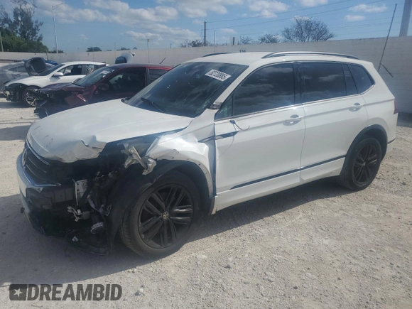 2022 Volkswagen Tiguan SE R-Line Black with VIN 3VVCB7AX8NM009403, listed as a Copart auction lot 52720885 with 74,063 mi miles and Salvage title. Bid and sale history available at DreamBid. Image 1.