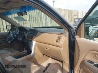 2005 Honda Pilot EX-L with VIN 5FNYF18575B046635, listed as a IAAI auction lot 42096210 with 222,490 mi miles and . Bid and sale history available at carsss.com. Image 5.