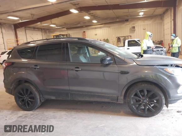 2017 Ford Escape SE with VIN 1FMCU0GD1HUC33119, listed as a IAAI auction lot 41884514 with 99,537 mi miles. Bid and sale history available at carsss.com. Image 13.