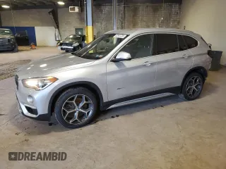 2017 BMW X1 xDrive28i with VIN WBXHT3C36H5F69280, listed as a Copart auction lot 52541235 with 69,051 mi miles and Salvage Title. Bid and sale history available at carsss.com. Image 1.
