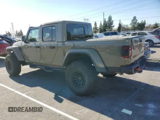 2020 Jeep Gladiator Mojave z VIN 1C6JJTEG9LL208784, wystawiony jako Copart lot #88921805 z przebiegiem 50 202 mil mil oraz Szkoda całkowita • Salvage title. Historia ofert i sprzedaży dostępna na DreamBid. Obrazek 2.