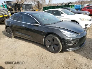 2018 Tesla Model 3 Long Range Battery with VIN 5YJ3E1EAXJF015971, listed as a Copart auction lot 47743665 with 94,064 mi miles and Salvage Title. Bid and sale history available at DreamBid. Image 4.