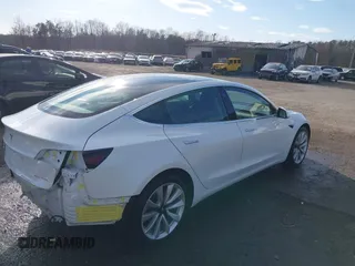 2019 Tesla Model 3 Long Range with VIN 5YJ3E1EB7KF442390, listed as a IAAI auction lot 41700122 with 65,539 mi miles. Bid and sale history available at carsss.com. Image 4.