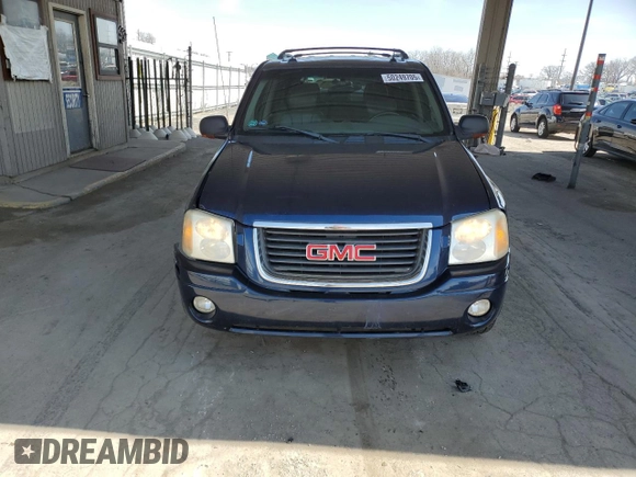 2004 GMC Envoy SLE with VIN 1GKDT13S142201271, listed as a Copart auction lot 50249705 with 248,364 mi miles and Salvage Title. Bid and sale history available at carsss.com. Image 5.