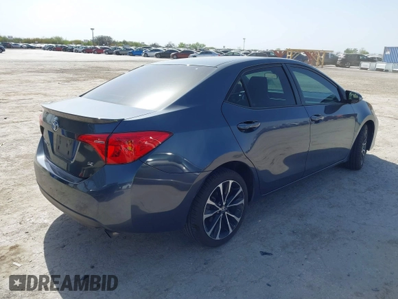 2019 Toyota Corolla L with VIN 5YFBURHE9KP910059, listed as a IAAI auction lot 41856905 with 104,096 mi miles and . Bid and sale history available at DreamBid. Image 4.