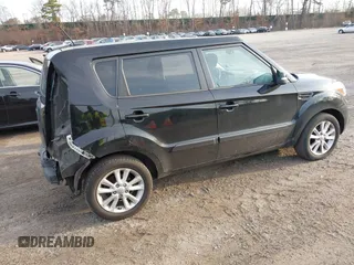 2012 Kia Soul + with VIN KNDJT2A69C7747537, listed as a IAAI auction lot 41895784 with 63,151 mi miles. Bid and sale history available at carsss.com. Image 4.