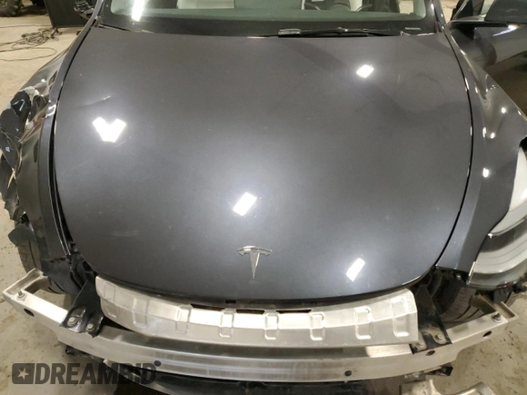 2024 Tesla Model Y Long Range with VIN 7SAYGDEE5RA237687, listed as a Copart auction lot 48366825 with 24,650 mi miles and Salvage Title. Bid and sale history available at DreamBid. Image 12.
