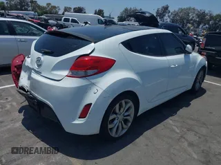 2012 Hyundai Veloster w/Black Int z VIN KMHTC6AD5CU056209, wystawiony jako IAAI lot #42565571 z przebiegiem 137 908 mil mil oraz . Historia ofert i sprzedaży dostępna na DreamBid. Obrazek 4.