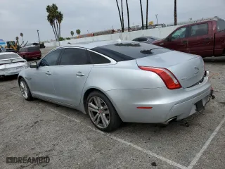 2014 Jaguar XJ with VIN SAJWJ2GD2E8V62696, listed as a Copart auction lot 76620494 with 85,487 mi miles and Salvage Title. Bid and sale history available at carsss.com. Image 2.