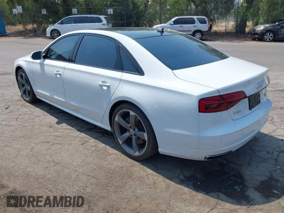 2017 Audi A8 Sport with VIN WAU43AFD3HN010445, listed as a IAAI auction lot 42714864 with 106,748 mi miles and . Bid and sale history available at DreamBid. Image 3.