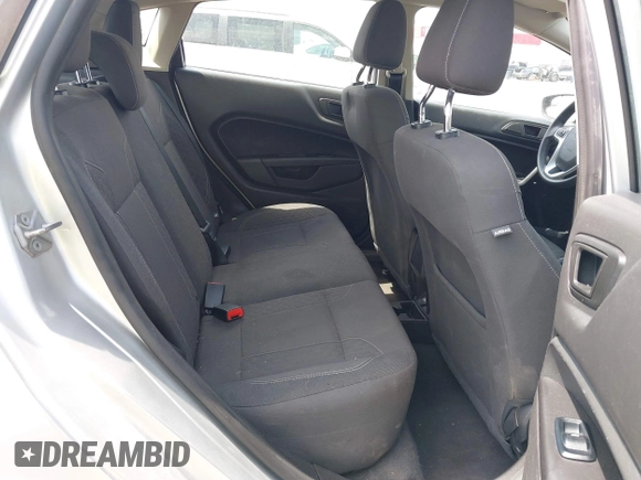 2019 Ford Fiesta SE z VIN 3FADP4EJ9KM107124, wystawiony jako IAAI lot #42067464 z przebiegiem 89 076 mil mil oraz . Historia ofert i sprzedaży dostępna na DreamBid. Obrazek 8.