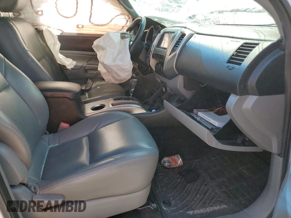 2014 Toyota Tacoma with VIN 5TFLU4EN8EX097721, listed as a Copart auction lot 54512555 with Not Provided miles and Non Repairable. Bid and sale history available at DreamBid. Image 7.