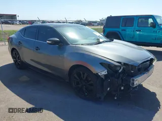 2018 Nissan Maxima SL with VIN 1N4AA6AP9JC360485, listed as a IAAI auction lot 42206521 with 140,898 mi miles and . Bid and sale history available at DreamBid. Image 1.